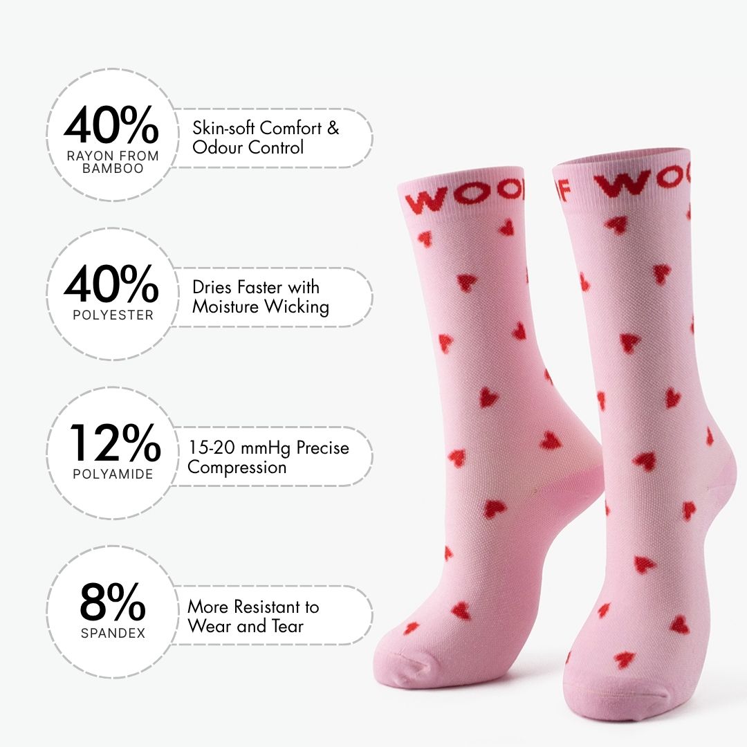 Studio shot of the Hearts Bamboo Crew Compression Socks accompanied by a material breakdown panel detailing the fabric mix: 40% bamboo viscose (breath comfort & odor control), 40% nylon (easy care & moisture wicking), 12% polyester (12-15mmHg precise compression), and 8% elastane (wear resistant to heel and toe).  